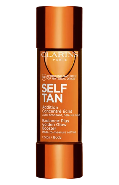 Clarins self-tanning concentrate in a sleek copper bottle that mixes with body lotion for a customizable, sun-kissed glow.