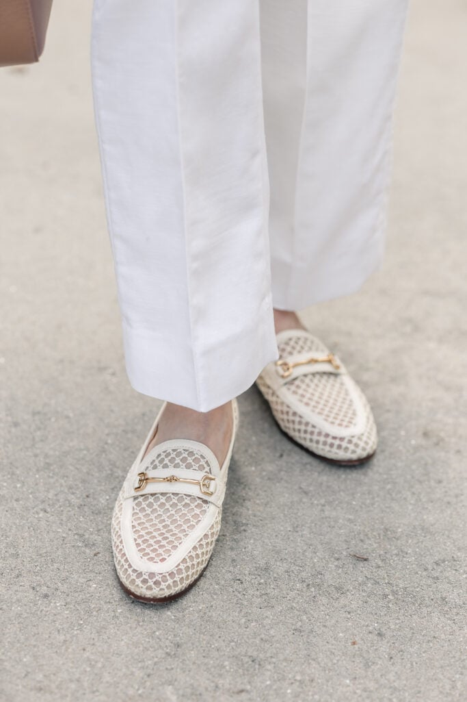 Close-up of Sam Edelman Loraine cream mesh bit loafer with gold hardware next to white straight-leg trouser hem — spring loafer for petite outfit