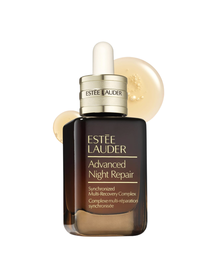 Estée Lauder Advanced Night Repair Synchronized Multi-Recovery Complex serum shown in the iconic dark amber glass bottle with a white pipette dropper and gold collar, with a swirl of golden serum behind it on a white background — an iconic anti-aging skincare Mother's Day beauty gift available on Amazon for women over 50.