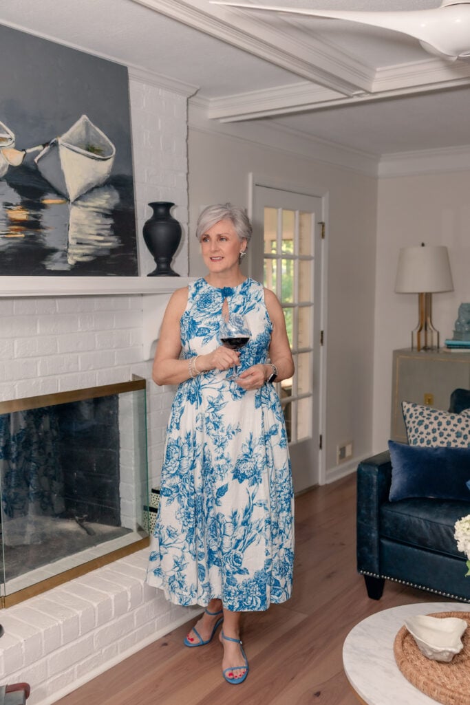 Cobalt blue and white floral midi dress with keyhole neckline and blue strappy sandals