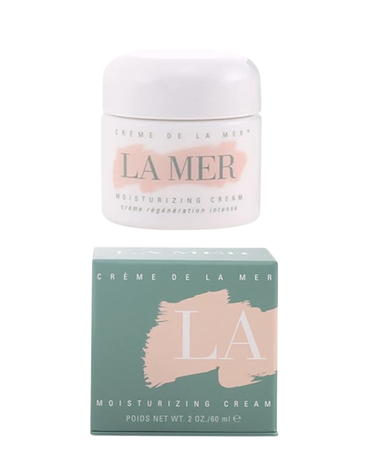 Crème de La Mer Moisturizing Cream 2 oz jar shown with its signature white lid and pale-pink and seafoam-green logo paneling, displayed beside its iconic seafoam-green and pink branded gift box on a white background — the ultimate luxury skincare splurge Mother's Day beauty gift available on Amazon for women over 50.