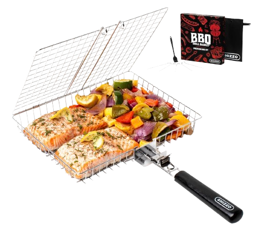 Stainless steel SHIZZO grill basket with folding grate and black handle filled with grilled salmon fillets and colorful vegetables including zucchini, peppers, onions, and lemon slices.