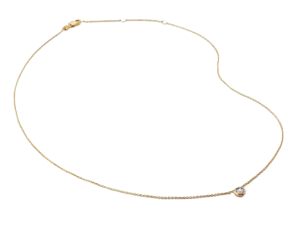Monica Vinader Diamond Solitaire Pendant Necklace featuring a delicate gold chain and a single bezel-set diamond pendant.