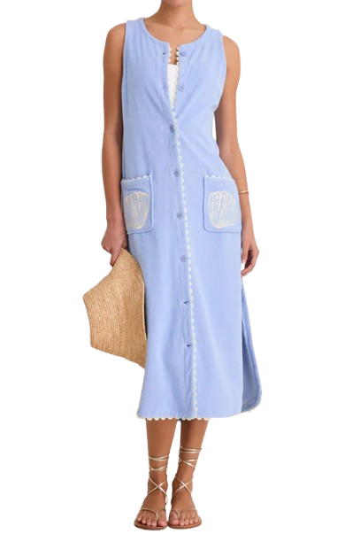 Sky blue sleeveless terrycloth caftan with button-front design, scalloped trim, embroidered shell pockets, and midi length styled with lace-up sandals and a woven clutch.
