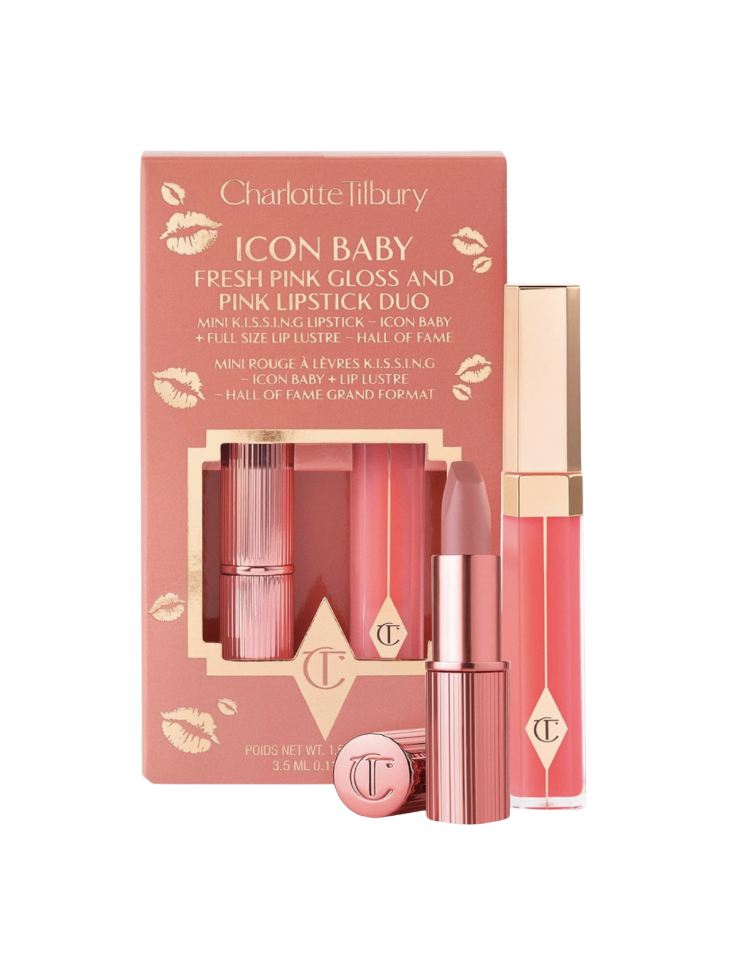 Charlotte Tilbury Icon Baby Fresh Pink Gloss and Pink Lipstick Duo shown in coral pink branded packaging featuring kiss prints, with a mini K.I.S.S.I.N.G lipstick in Icon Baby (a soft pink shade in a rose-gold tube) and a full-size Lip Lustre gloss in Hall of Fame (a fresh pink gloss in a rose-gold capped tube), photographed on a white background — a fresh pink lipstick and gloss Mother's Day beauty gift duo available on Amazon for women over 50.