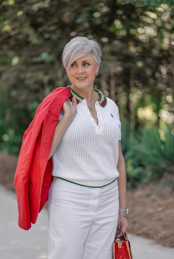 Open-stitch V-neck polo sweater with white twill pants