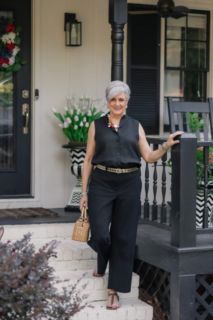 Beth Djalali wearing a Eileen Fisher mandarain collar linen top and black pants
