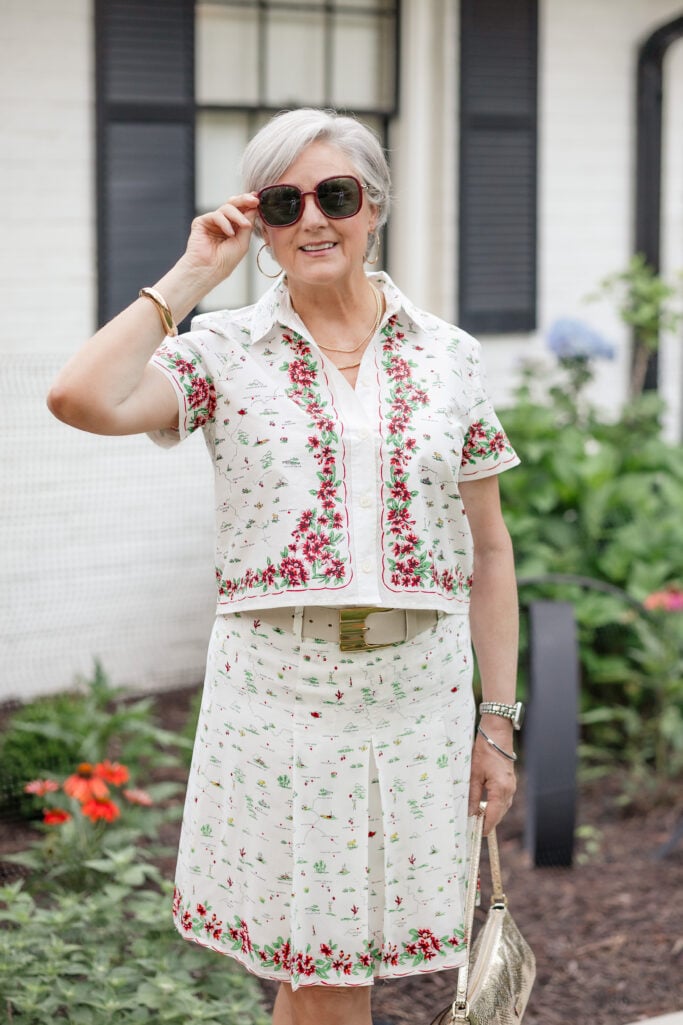 Summer outfit idea for women over 50 featuring floral separates and comfortable gold sandals