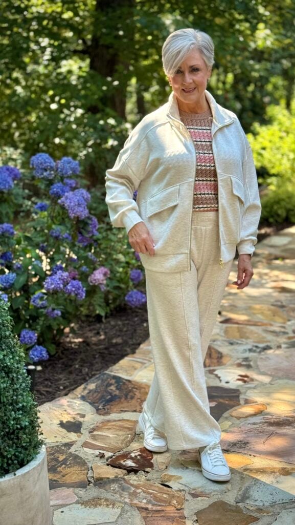Ivory marl matching sweatshirt and slim cuff pant elevated lounge set styled for airport travel
