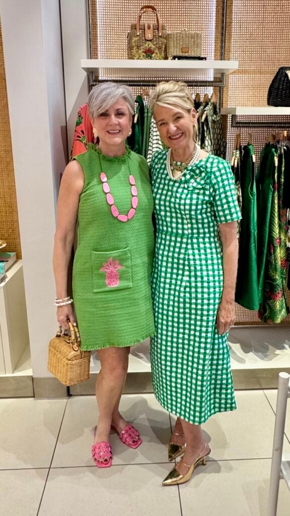 Beth Djalali wearing a green Frances Valentine Twiggy Fringe Dress with pink sandals while meeting Elyce Arons in Atlanta