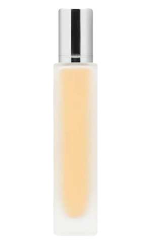 HUDA BEAUTY Easy Bake Fragrance Intense travel spray in a sleek frosted bottle, inspired by the brand’s iconic setting powder with warm, sweet gourmand notes.