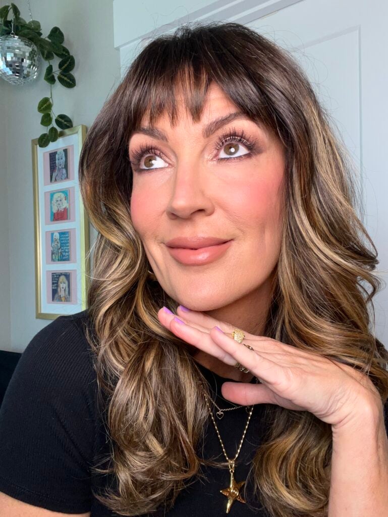 Close-up of finished drugstore makeup look on a woman over 50