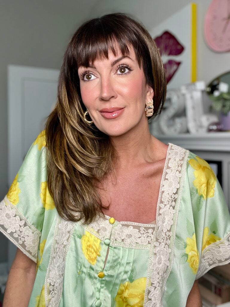 Finished makeup look on a woman over 50 after using all seven beauty products