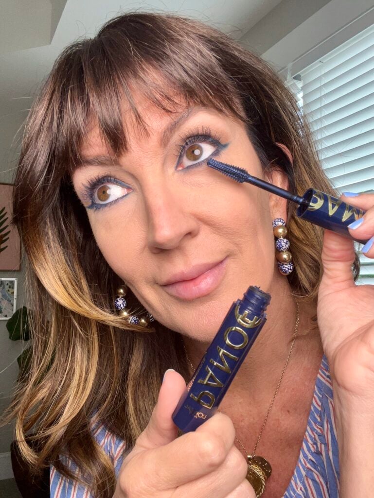 Navy blue mascara for a subtle patriotic makeup look over 50