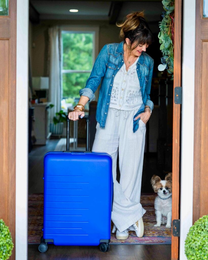 Cobalt blue Quince check-in suitcase for summer travel