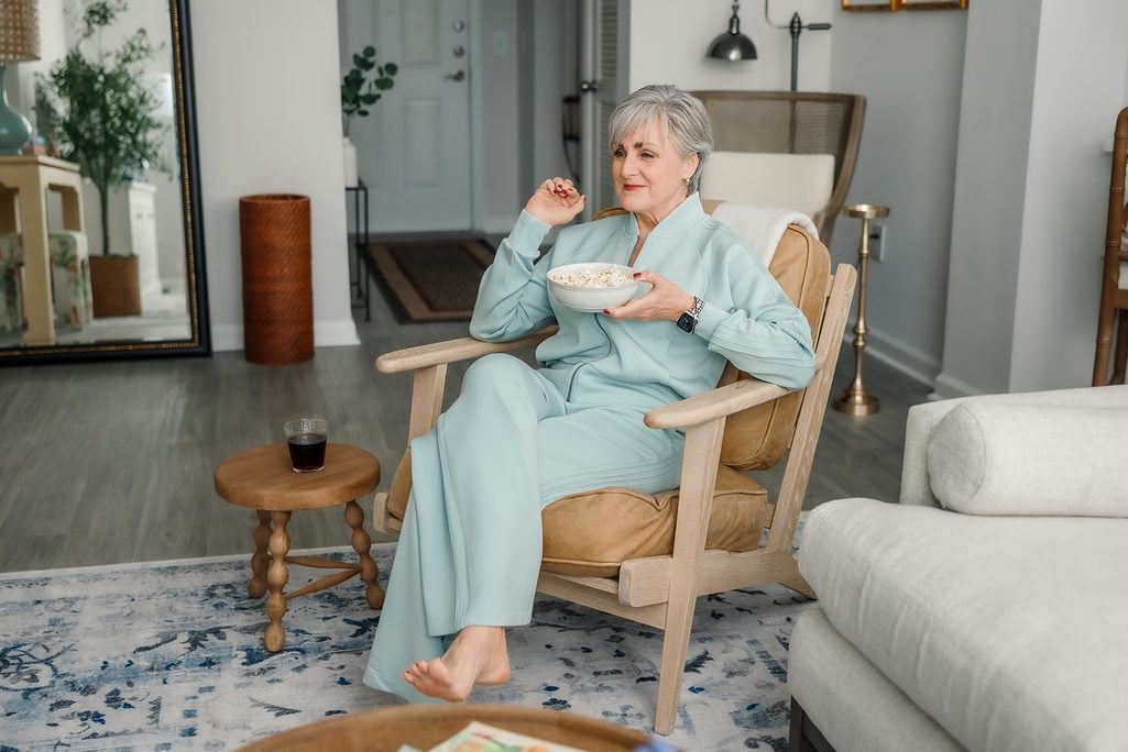  Pale aqua Spanx pintuck matching set on Beth Djalali — zip-front track jacket and wide-leg pants for a cozy night in