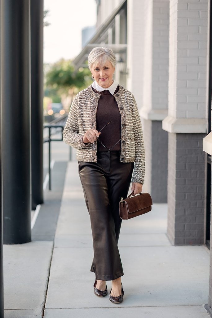 Photographer Jess Lowell shooting Beth Djalali on an Atlanta street for Style at a Certain Age