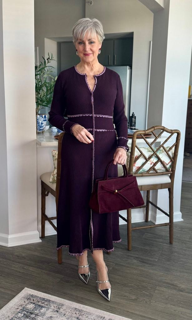 Burgundy ribbed sweater dress with lilac trim, silver pumps and a burgundy suede bag — weekend in Chicago outfits for dinner