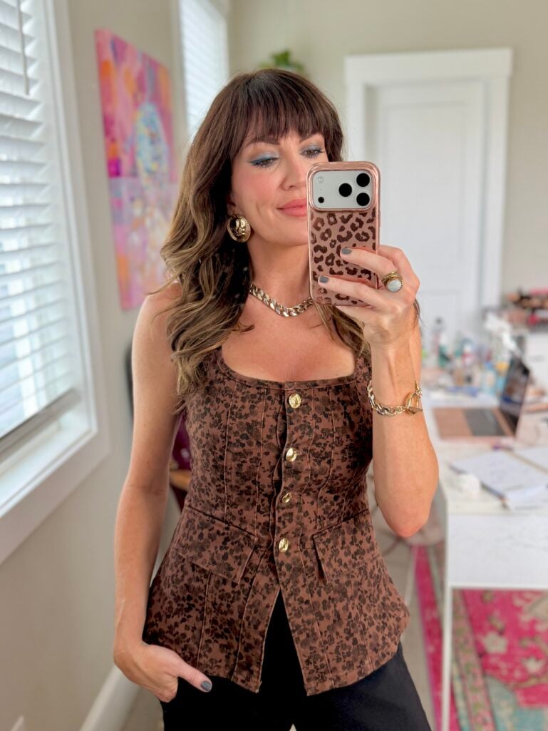 Mirror shot showing outfit and makeup