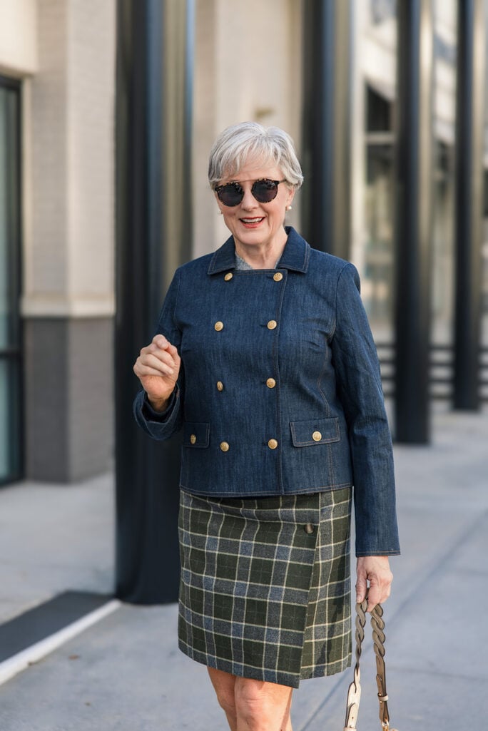 Close-up of the double-breasted denim jacket from today's cover photo, worn with a plaid wrap skirt