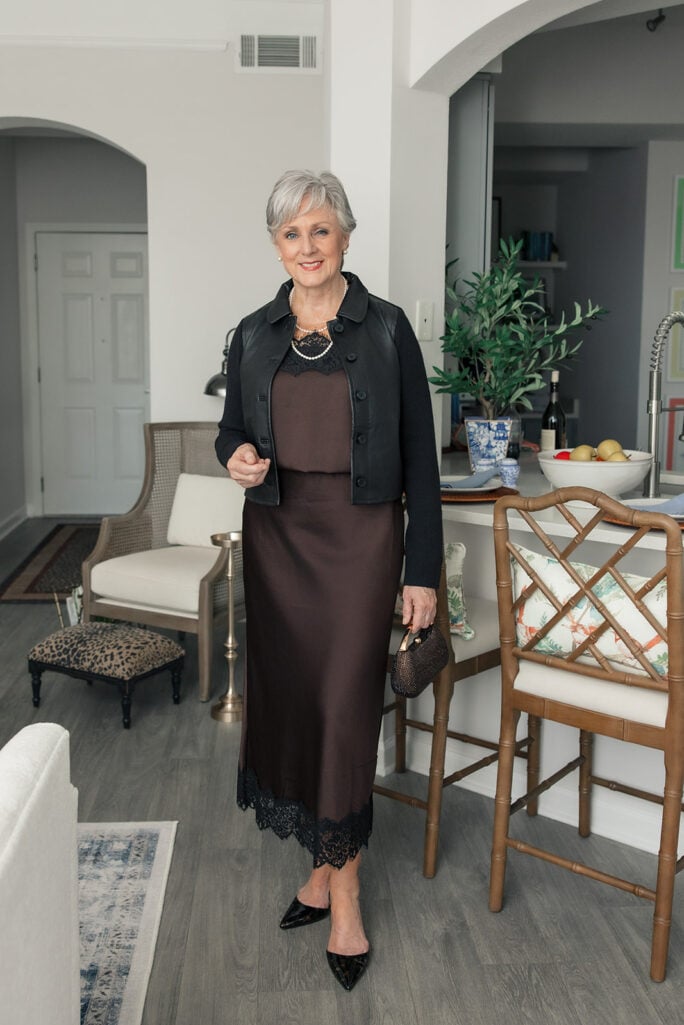 Leather-front, knit-sleeve jacket with a lace-trimmed cami and midi skirt