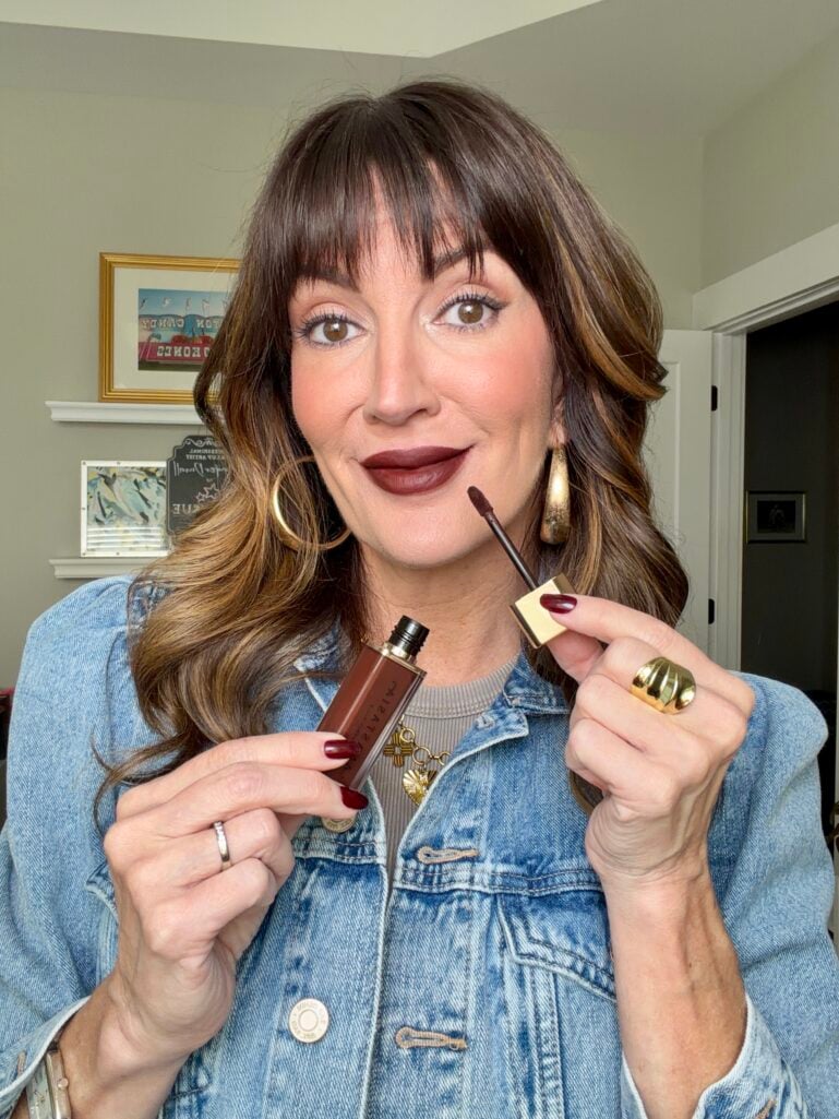 Beth wearing brown lipstick in a modern over-50 makeup look